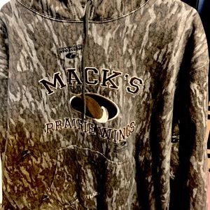Boys L hoodie. Mossy Oak Bottom Land. Mack’s Prairie Wings. Great condition.